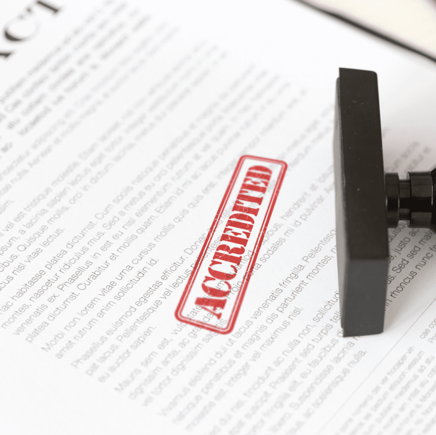 A contract with an "Accredited" stamp. 